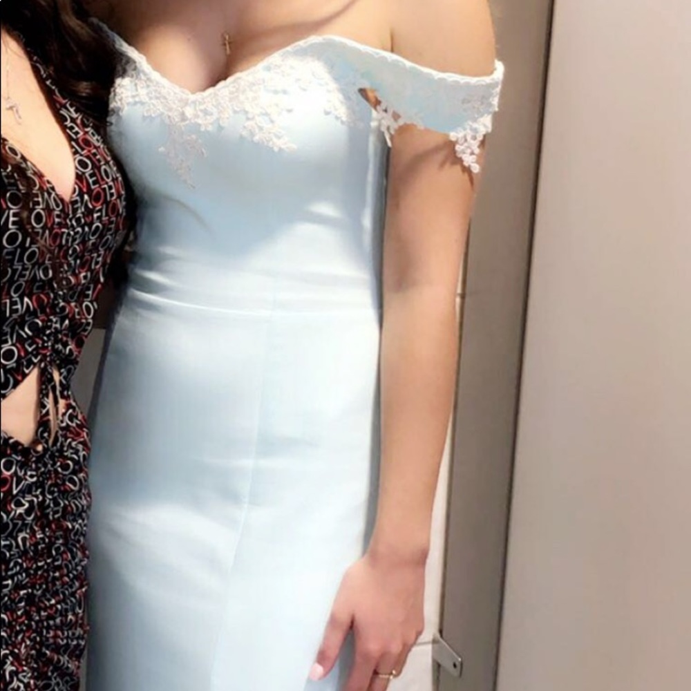 Blue dress with white lace detailing